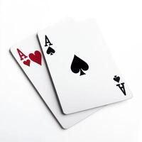 Two playing cards featuring ace of hearts and ace of spades on white background photo