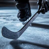 ice hockey stick on ice photo