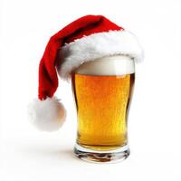 Santa Claus hat with glass of beer isolated on a white background photo