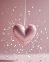Glittering pink heart decoration with floating gems on a soft pink background photo
