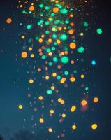 Colorful Light Particles Cascading Down in a Mesmerizing Display at Night photo