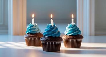 Chocolate cupcakes with blue frosting and candles ready for celebration in a bright indoor setting photo