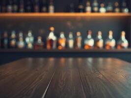 A wooden table in front of a bar with bottles on it photo