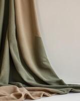 Brown green cloth surface Gradient Olive colors Dark shade Abstract fabric background with space for. photo