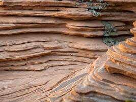 Layered Natural Rock Formation in Earthy Tones for Textural Background or Geological Study Use. photo