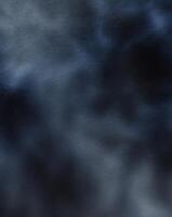 A velvet texture background with gradients of deep indigo and soft black for a luxurious tone. photo