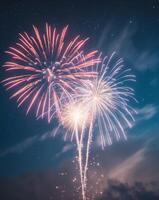 Firework Display Creating Bursts of Light on a Dark Night Sky in a Festive Celebration. photo