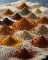 Vibrant Spices and Powders on Rustic Burlap Mat photo