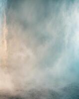 A man is standing in front of a cloud of smoke photo