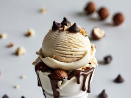 Delicious hazelnut ice cream dripping with chocolate and toppings. photo