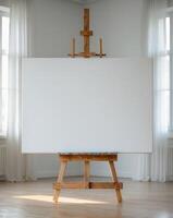a large blank white canvas on a sturdy wooden easel standing in an art studio. photo