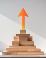 Wooden Blocks Forming a Pyramid with an Arrow Symbolizing Growth Concept photo