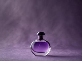 Studio shot of purple perfume bottle on matching purple background. photo