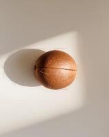 Flat Lay Top View of Bright Ripe Fragrant Brown Coconut Fruit as Background. photo