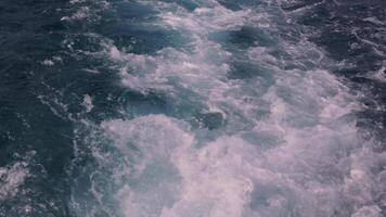 Dynamic Ocean Waves with Frothy Whitecaps and Swirling Blue Water video
