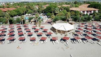 Resort Area with Pool, Thatched Roofs, and Red Tiled Buildings video