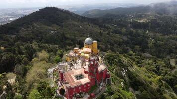 Pena Palace in Sintra, Portugal with Vibrant Towers and Forested Hills video