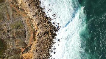 Aerial View of Rugged Cliffs and Atlantic Ocean on Portugal's Coastline video