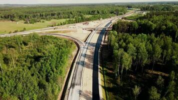 Highway Construction Site with Overpass in Rural Forested Area video