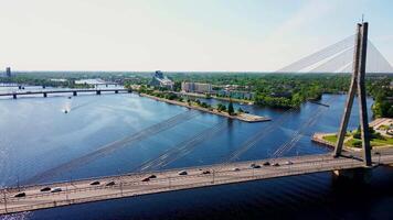 Vansu Bridge and National Library of Latvia Over Daugava River in Riga video