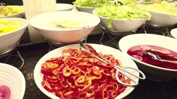 Colorful Buffet Display with Fresh Ingredients on Dark Countertop video