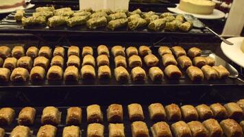 Assortment of Traditional Pastries on Display at Dessert Buffet video