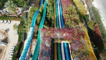 Vibrant Water Park with Colorful Slides and Beach Area video