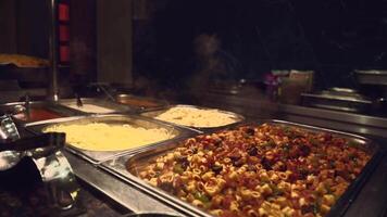 Buffet Display of Diverse Pasta Dishes in Indoor Setting video