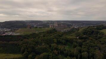 Dover Castle on Cliffs with Town and Rolling Hills in Background video