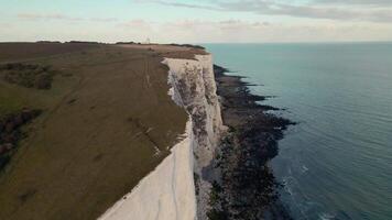 White Cliffs of Dover with Lighthouse and Grassland View video