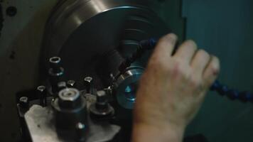 Close Up of Metalworking Lathe in Operation with Hand Adjustment video