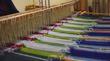 Close Up of Traditional Weaving Loom with Colorful Threads video