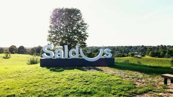 Saldus Sign with Cobblestone Path and Town View in Latvia video