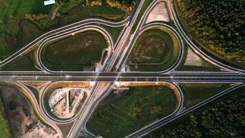 Aerial View of Cloverleaf Highway Interchange with Construction Activity video