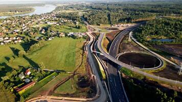 Complex Highway Interchange with Roundabout and River in Background video