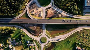 Aerial View of Complex Road Interchange with Roundabout and Overpass video