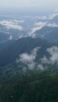 Experience the Serene and Tranquil Mountain Landscape Filled with Lush Greenery and Scenic Clouds. Stock Clip video