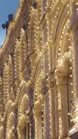 An Illuminated Historic Building Captivatingly Glows at Dusk, Creating a Charming Atmosphere. Action video