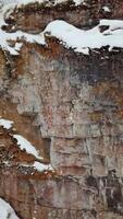 A Beautiful Snowy Rocky Terrain Featuring Unique and Textured Cliffs and Stunning Views. Stock Clip video