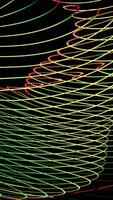 Dynamic with vibrant lines on a black background creates visual appeal. Design video
