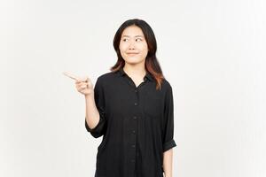 Showing Product and Pointing Side of Beautiful Asian Woman Isolated On White Background photo