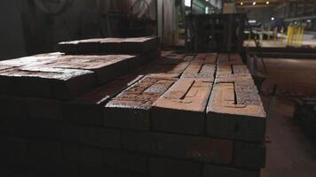 Stack of Bricks in Industrial Setting with Equipment and Barriers video