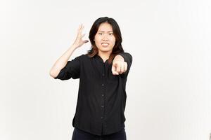 Pointing at camera and angry gesture of Beautiful Asian Woman Isolated On White Background photo