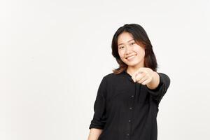 Smiling and pointing at camera of Beautiful Asian Woman Isolated On White Background photo