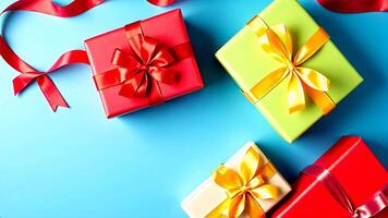 Colorful gift boxes wrapped in red, blue, and cream, each adorned with matching ribbons, are arranged on a bright blue background. video