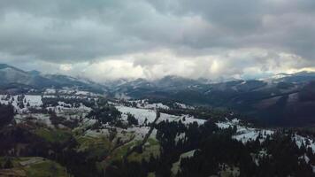 Flight over the winter landscape in the Carpathian mountains. 4K video