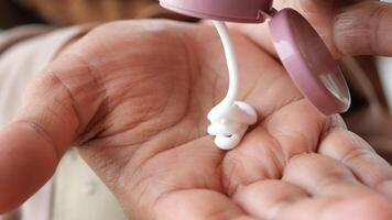 Applying Moisturizing Cream to Hands for Ultimate Hydration and Nourishing Care Experience video