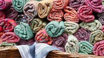 A Wide Selection of Rolled Towels Available in Various Colors and Textures video