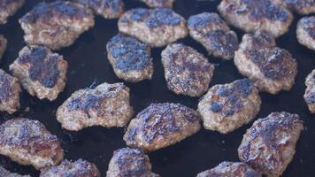 Grilling Scrumptious and Flavorful Beef Patties on a Hot Griddle Surface video