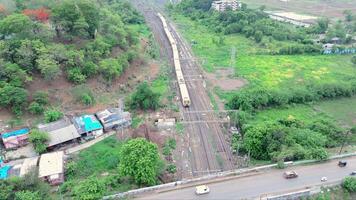 Drone captures rail passing beneath roadway video